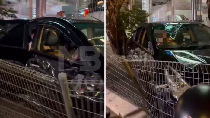 Nissan Almera naik 'divider' jalan, dipercayai dipandu individu mabuk
