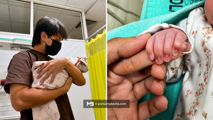 Sir Uzairi timang cahaya mata sulung perempuan