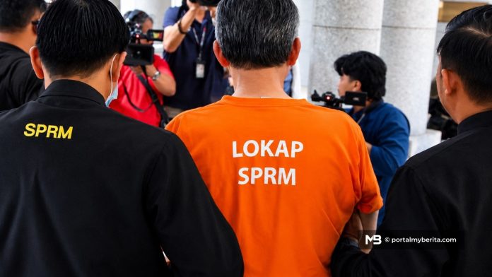 SPRM henti pakai baju oren OKS ke mahkamah serta-merta